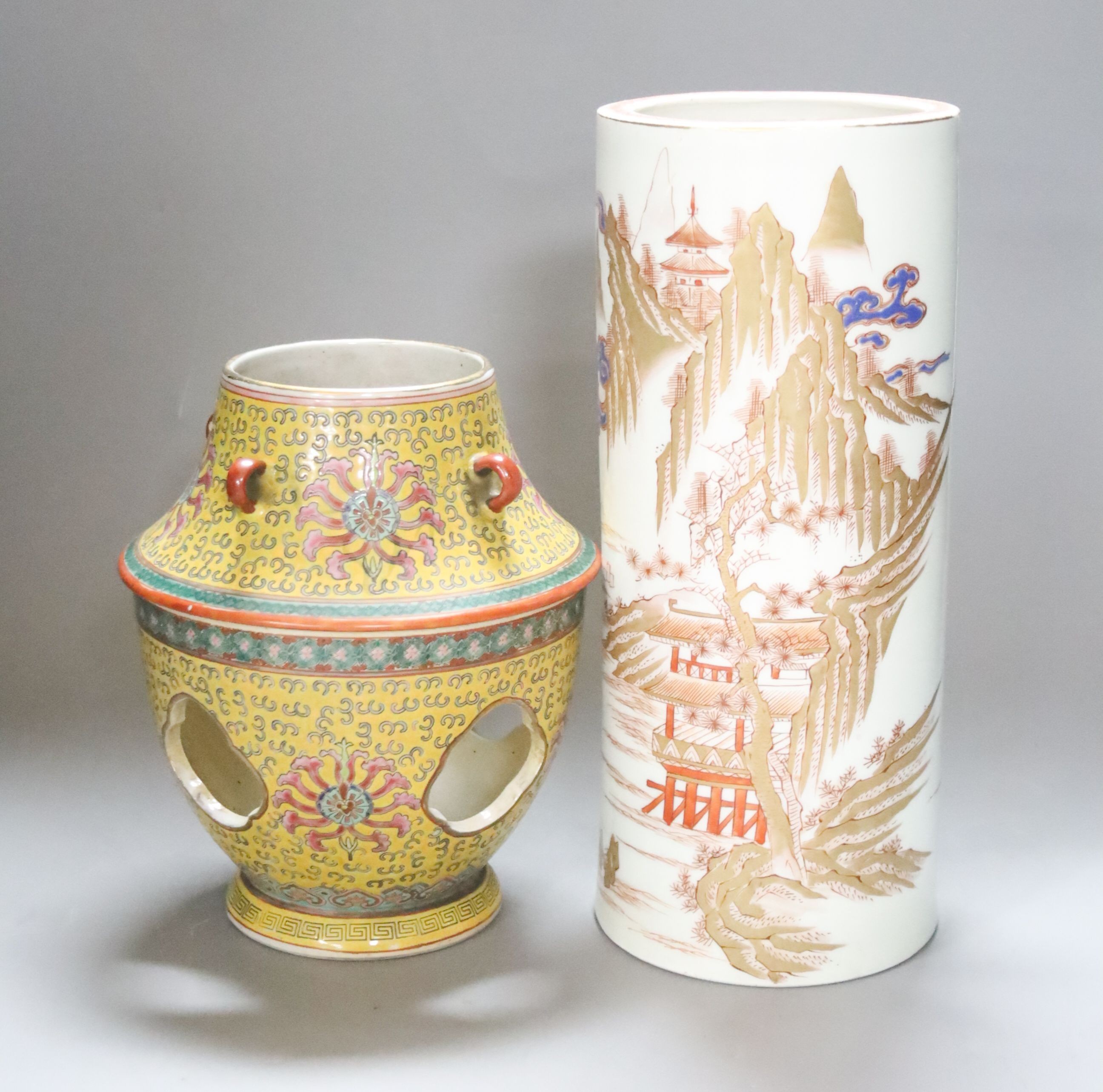 A Japanese porcelain cylindrical vase and a Chinese yellow ground two-section vessel and cover, 29cm
